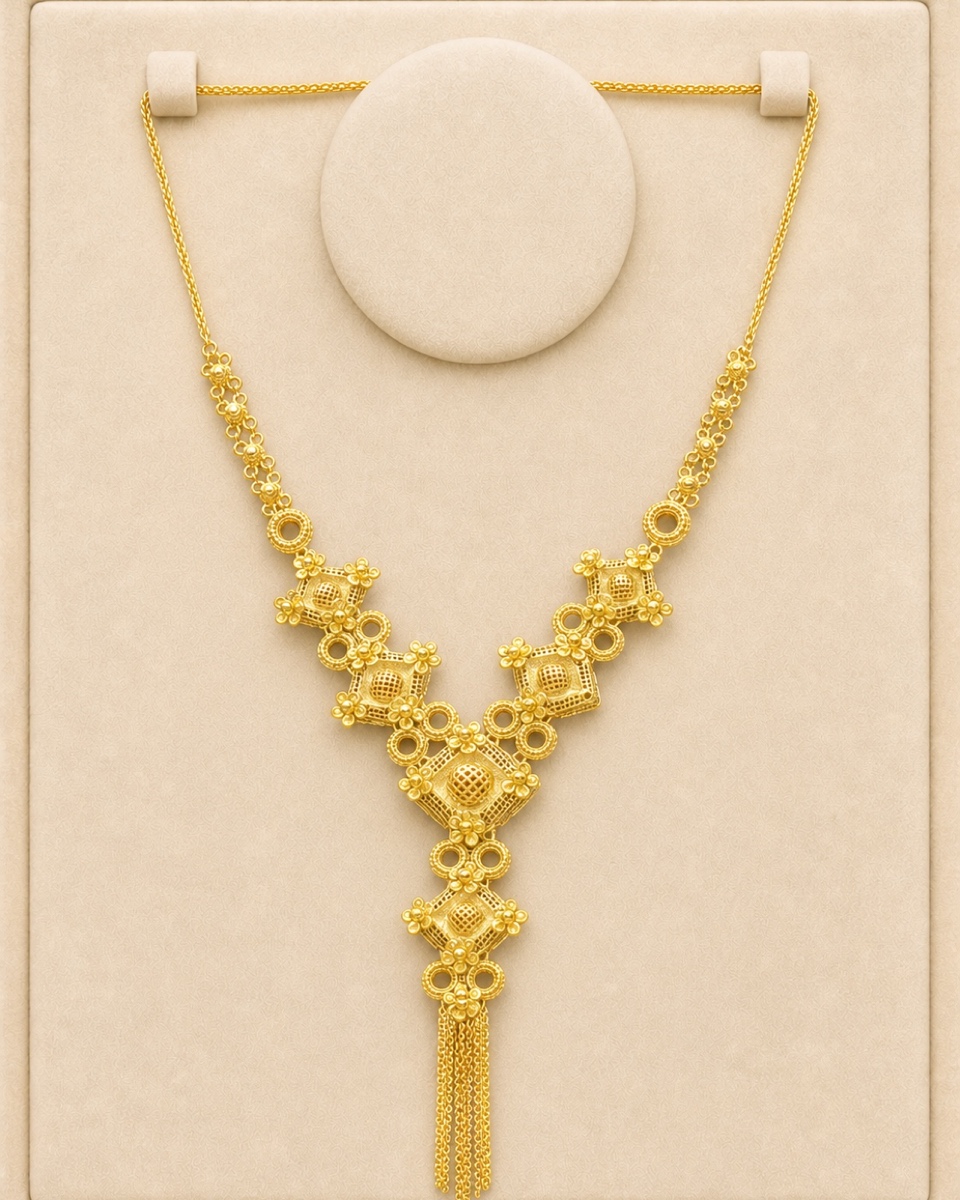Style reference · Geometric Y-tassel necklace